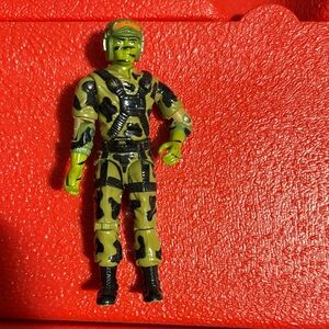 Green and Black Camouflage Action Figure